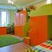 Многофункциональная детская комната для двоих детей. Яркая, но не раздражающая. Выбранное цветовое решение: микс оранжевого с салатовым. 